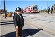 Child in firefighter cap