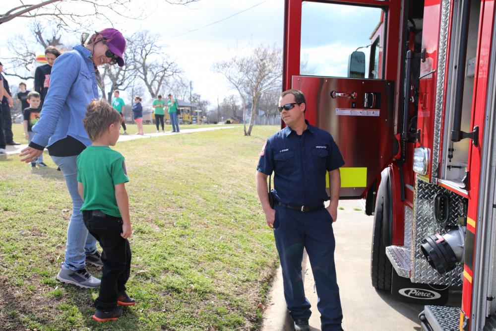 Small child and firefighter