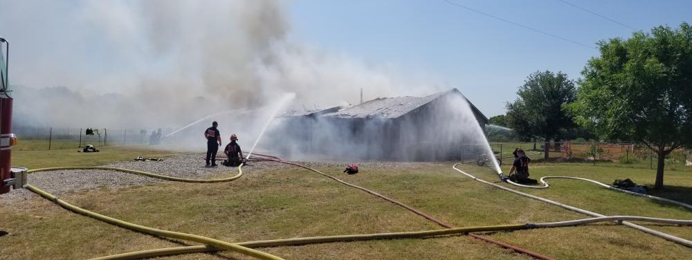 Firefighters putting out a fire