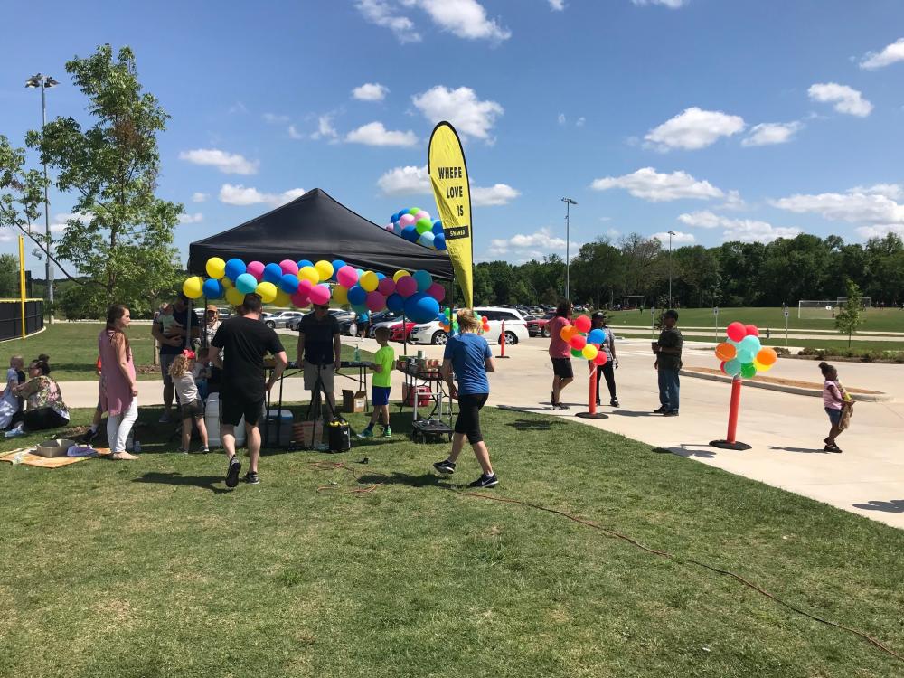 Balloons and people at event